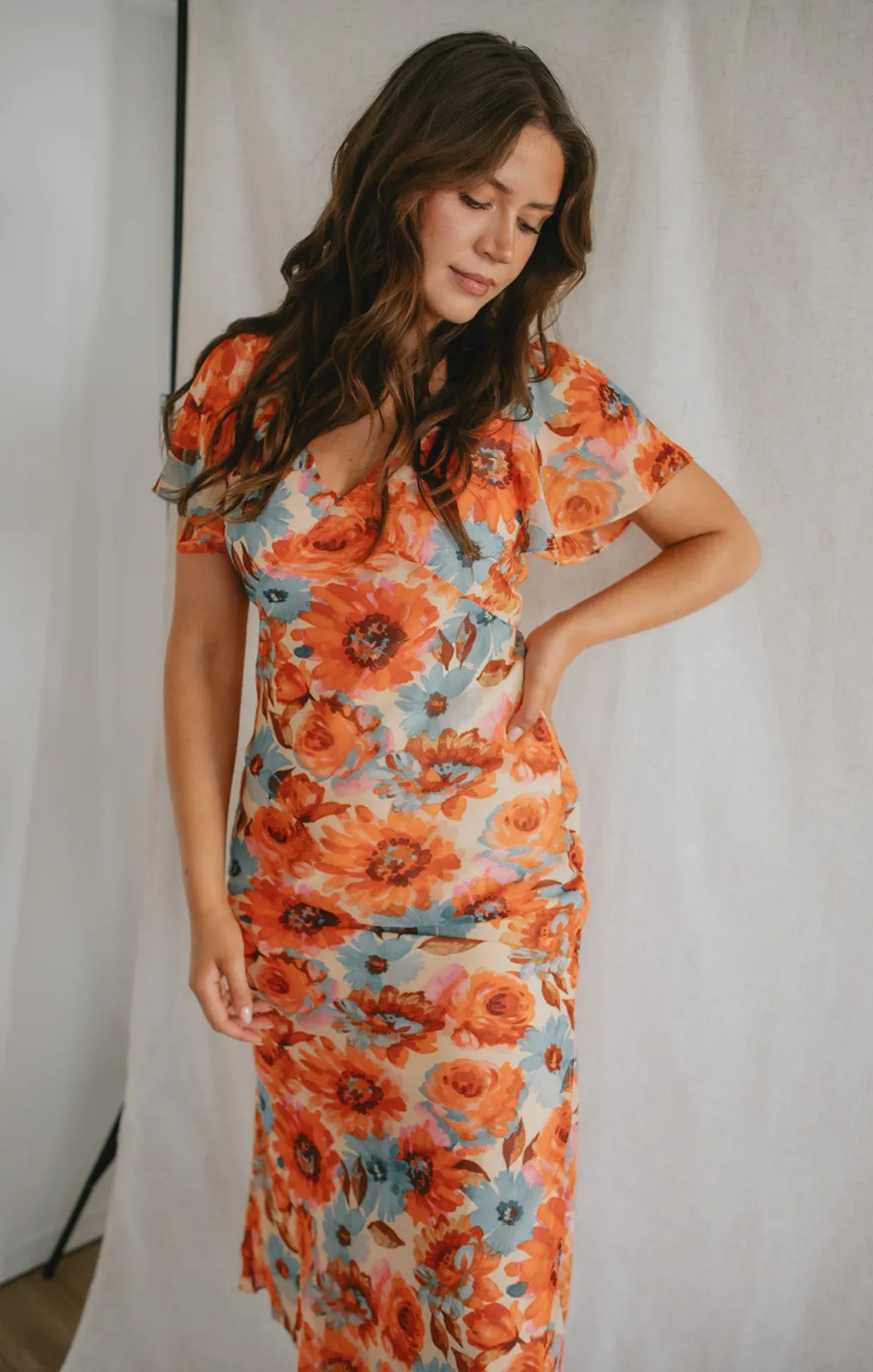 The Bright Eyed Flutter Sleeve Maxi Dress